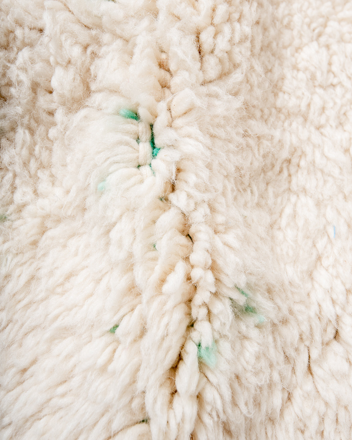 Modern, designer, handcrafted Berber rug from Morocco. Beniourain carpet with beautiful colours and patterns and fluffy wool texture.